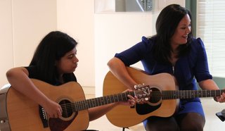 Guitar Student and Guitar Teacher